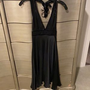 Black sillk plunge neck backless halter dress. Size 2 l